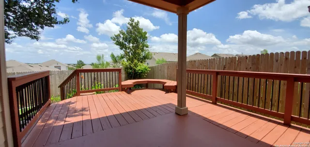 a view of balcony with furniture
