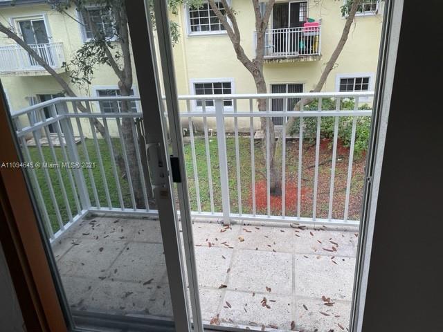 Oasis Homestead, FL 33033 - Photo 22 of 37 a view of a balcony with door
