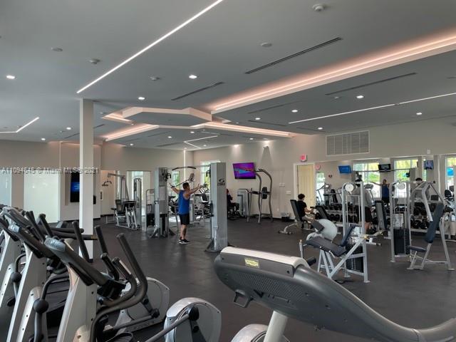 Oasis Homestead, FL 33033 - Photo 24 of 37 a view of a room with gym equipment