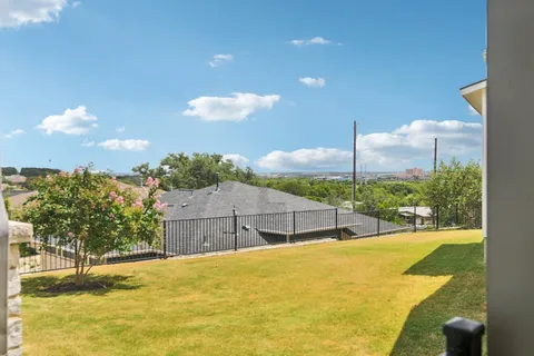 a view of house with yard