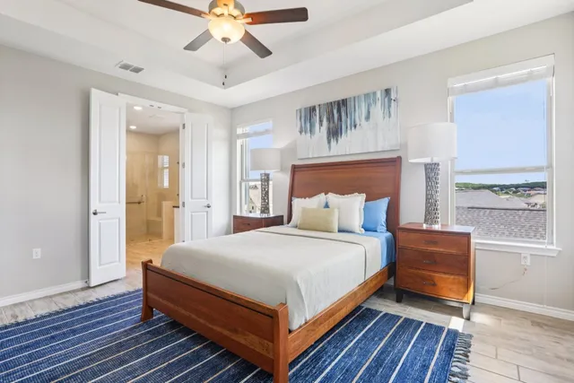 a bedroom with a bed and window