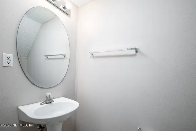 a view of empty room with windows