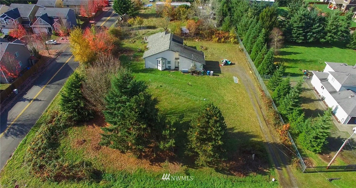 159 Yakima Avenue Southeast Renton, WA 98059 - Photo 5 of 19 an aerial view of residential house with outdoor space and trees all around