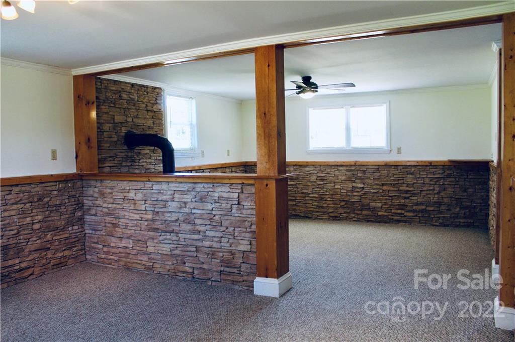 4197 Renee Ford Road Stanfield, NC 28163 - Photo 18 of 23 a view of living room with furniture and a window