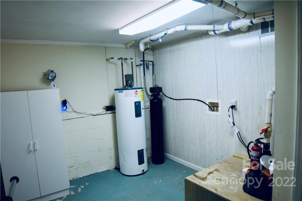 4197 Renee Ford Road Stanfield, NC 28163 - Photo 23 of 23 a room with water heater and refrigerator