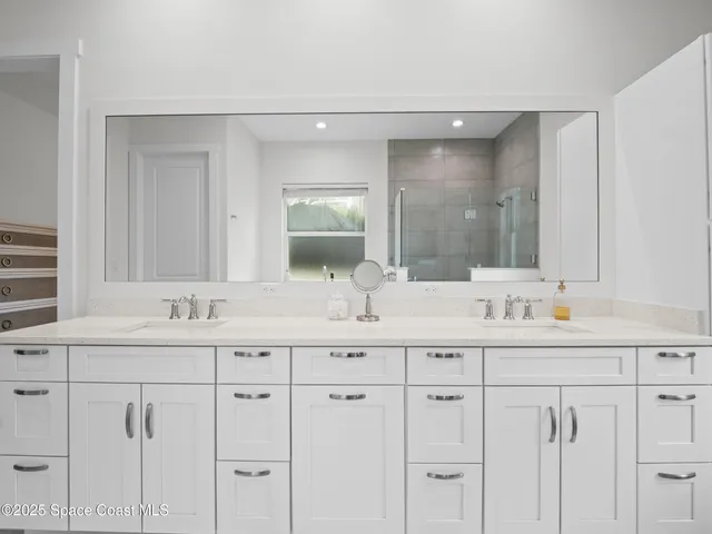 a view of a livingroom with workspace and a window