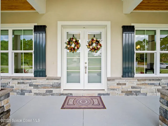 a kitchen with kitchen island granite countertop counter top space cabinets and stainless steel appliances