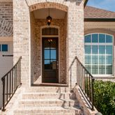a view of a house with a window and wooden floor