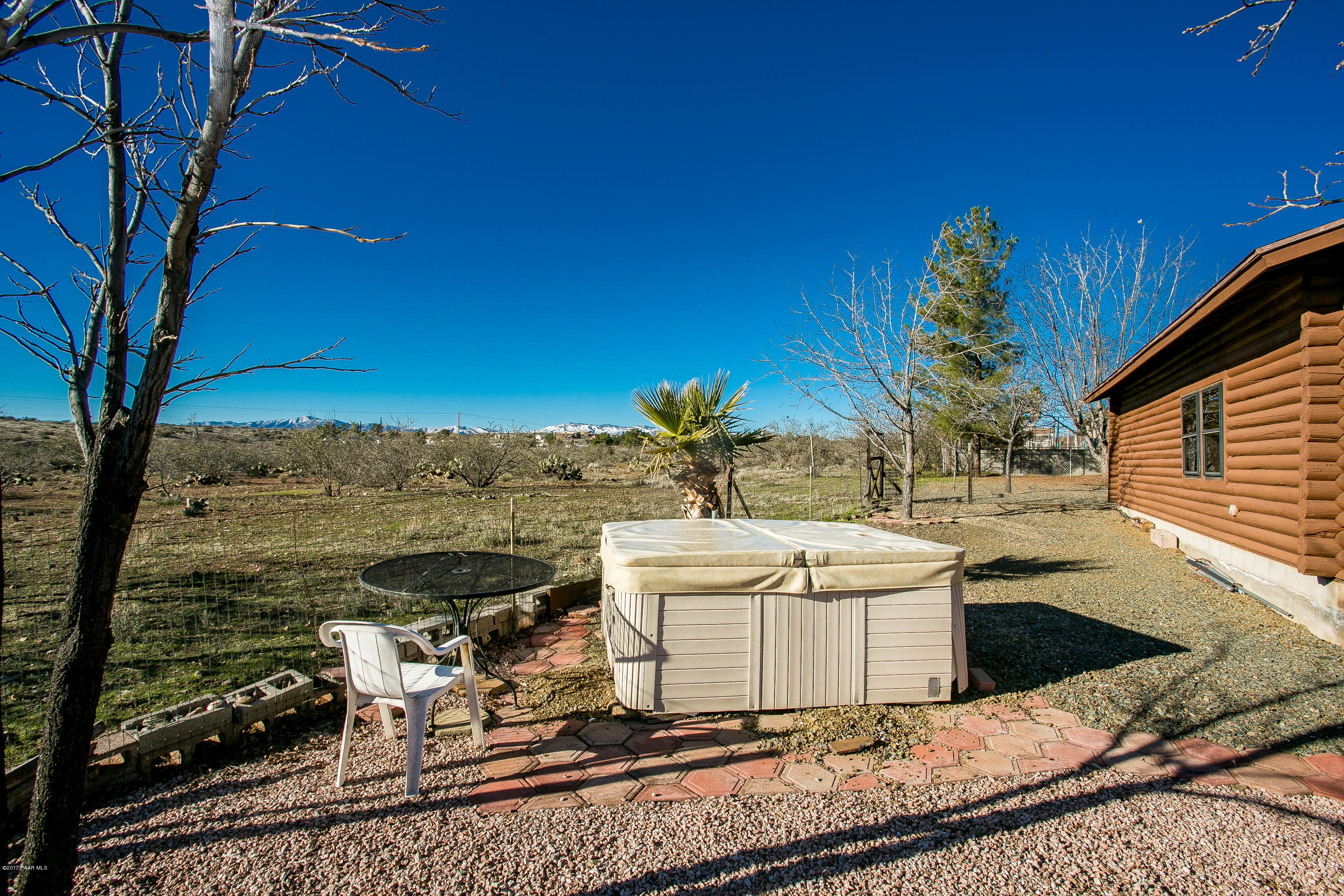 17653 East Trails End Road Spring Valley, AZ 86333 - Photo 16 of 18 a view of a terrace with a bench