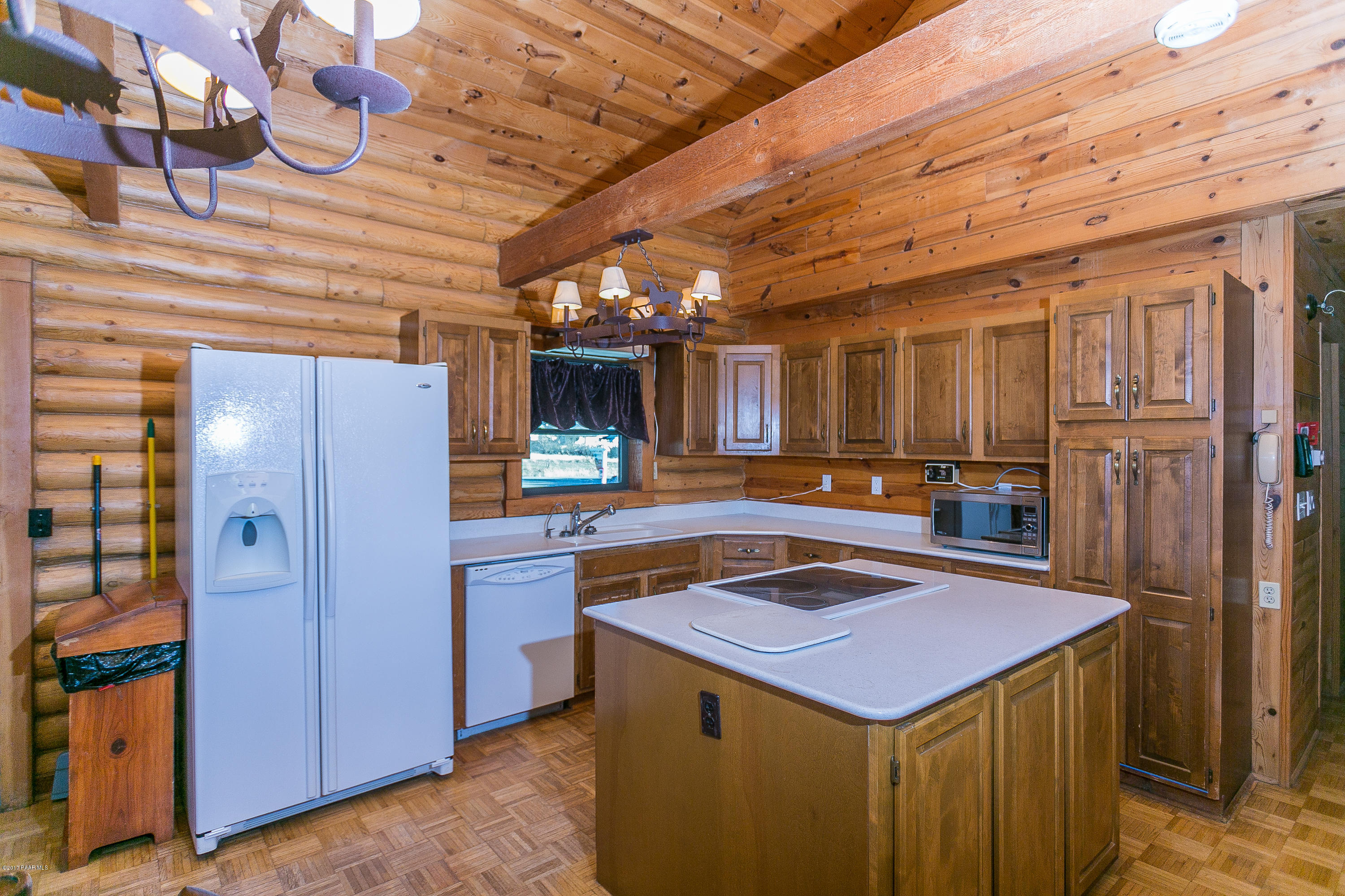 17653 East Trails End Road Spring Valley, AZ 86333 - Photo 5 of 18 a kitchen with a stove and a refrigerator
