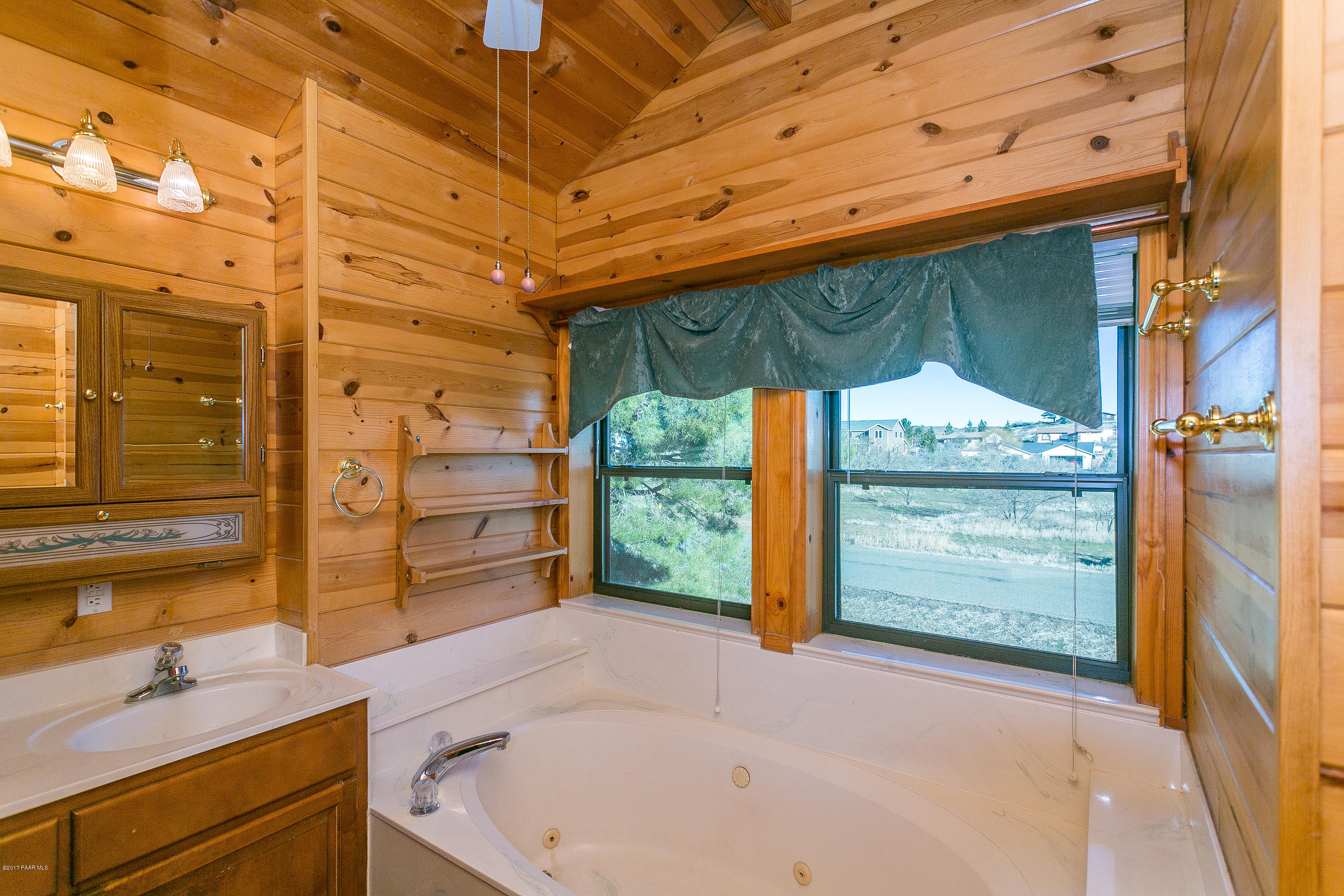 17653 East Trails End Road Spring Valley, AZ 86333 - Photo 7 of 18 a bathroom with a tub and shower