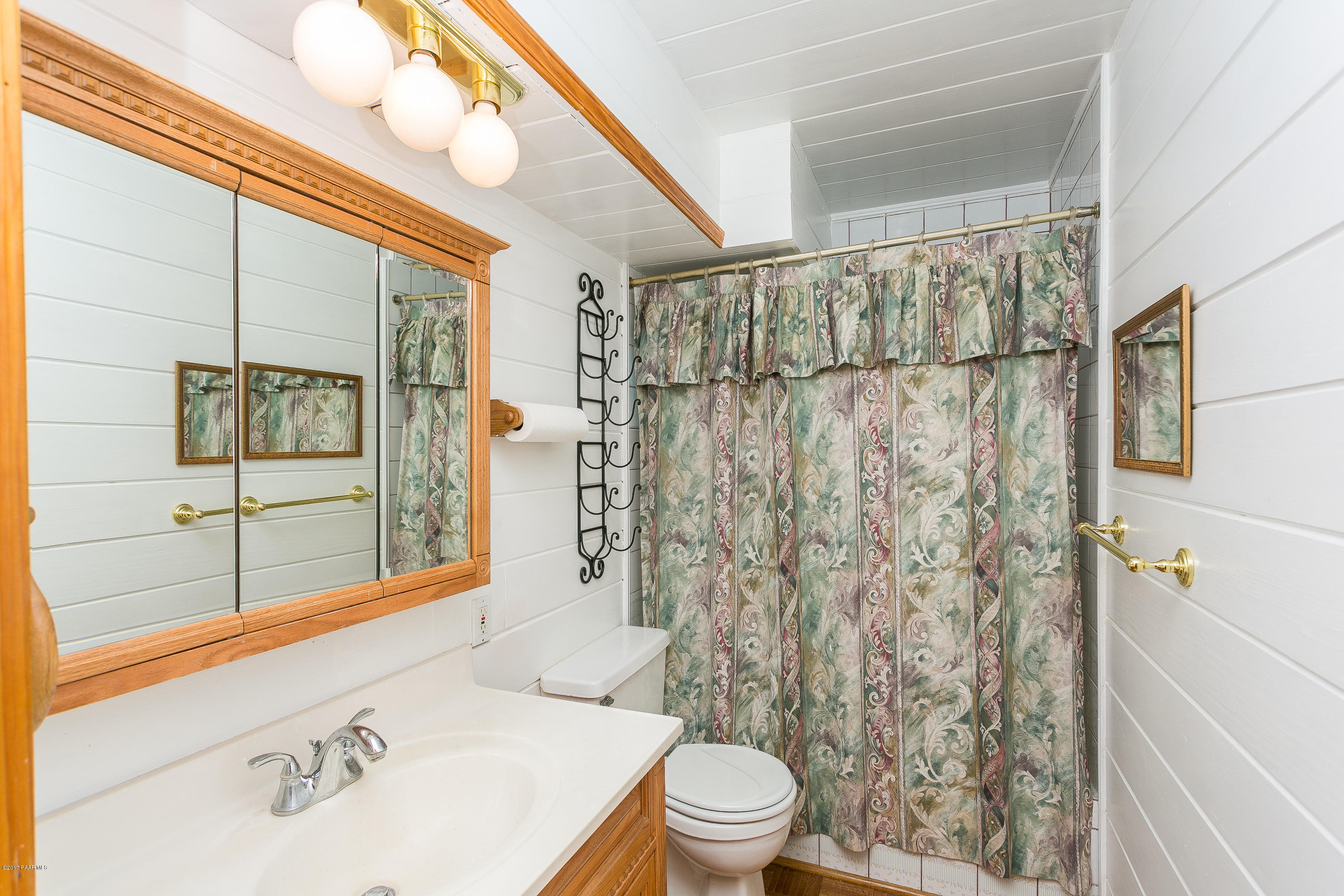 17653 East Trails End Road Spring Valley, AZ 86333 - Photo 9 of 18 a bathroom with a sink toilet and shower
