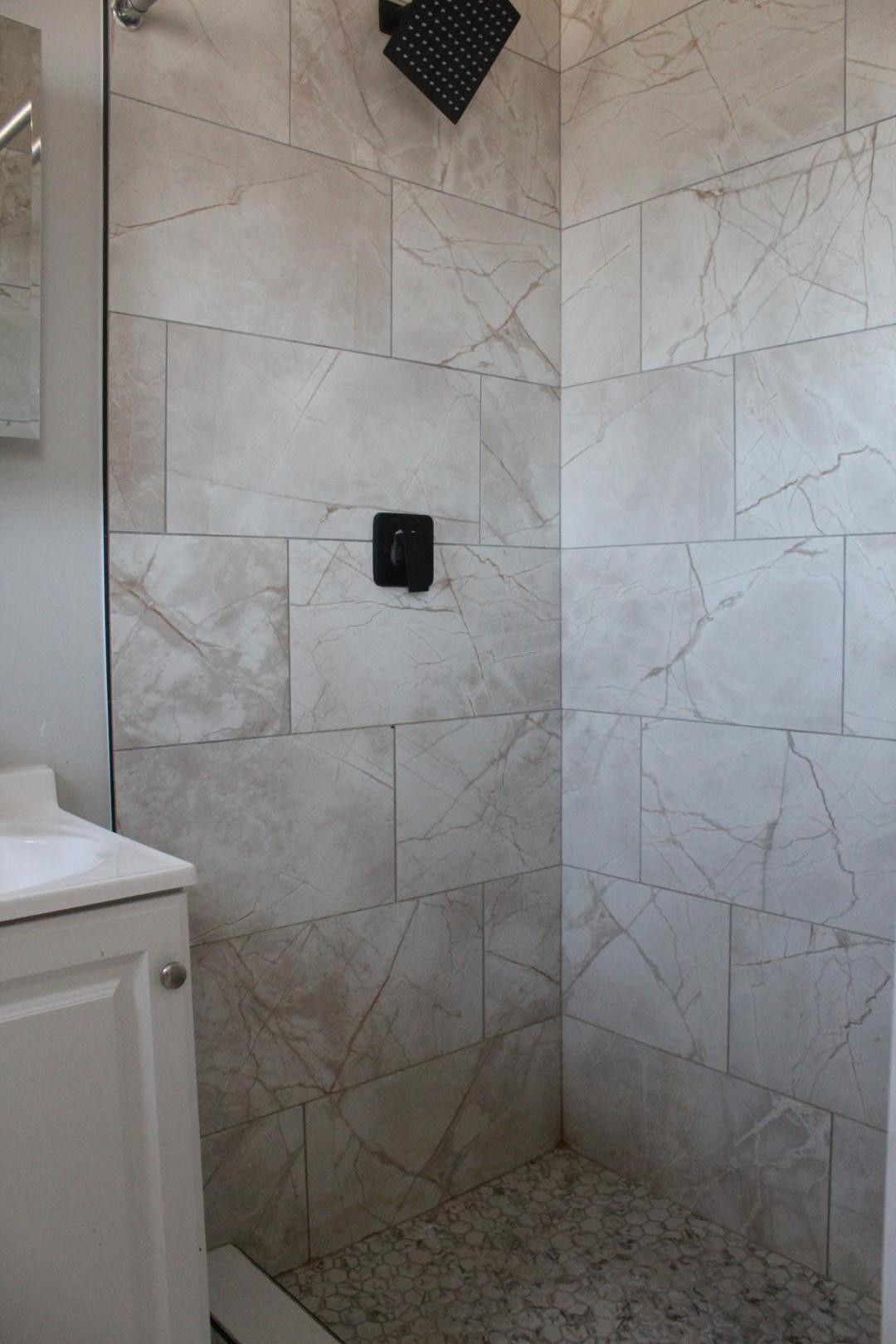 3932 West Griswold Road Phoenix, AZ 85051 - Photo 14 of 20 a bathroom with a shower