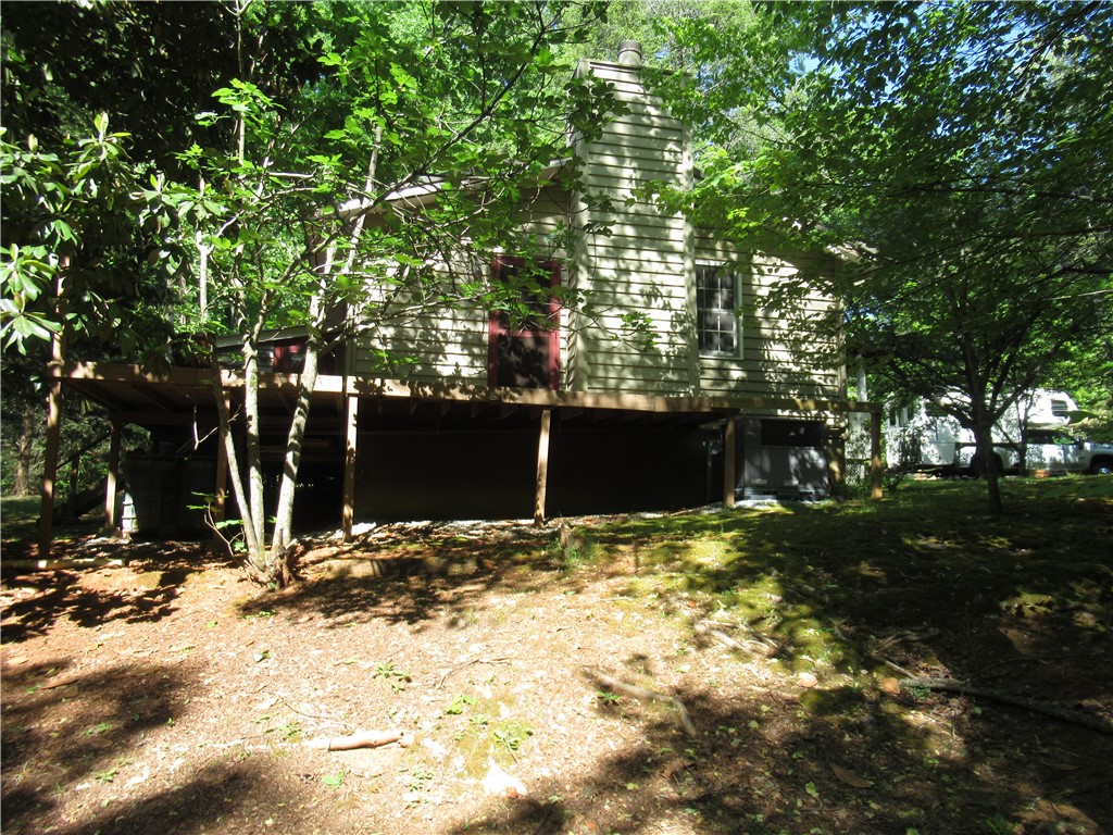 437 West Gate Road Pickens, SC 29671 - Photo 32 of 47 This elevated home is nestled among mature trees, offering a private and serene woodland escape.