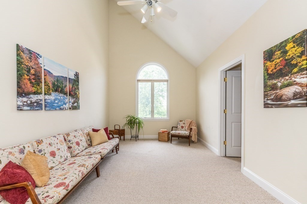216 Rangeway Road, Unit 161 Billerica, MA 01862 - Photo 30 of 39 a living room with furniture and a large window