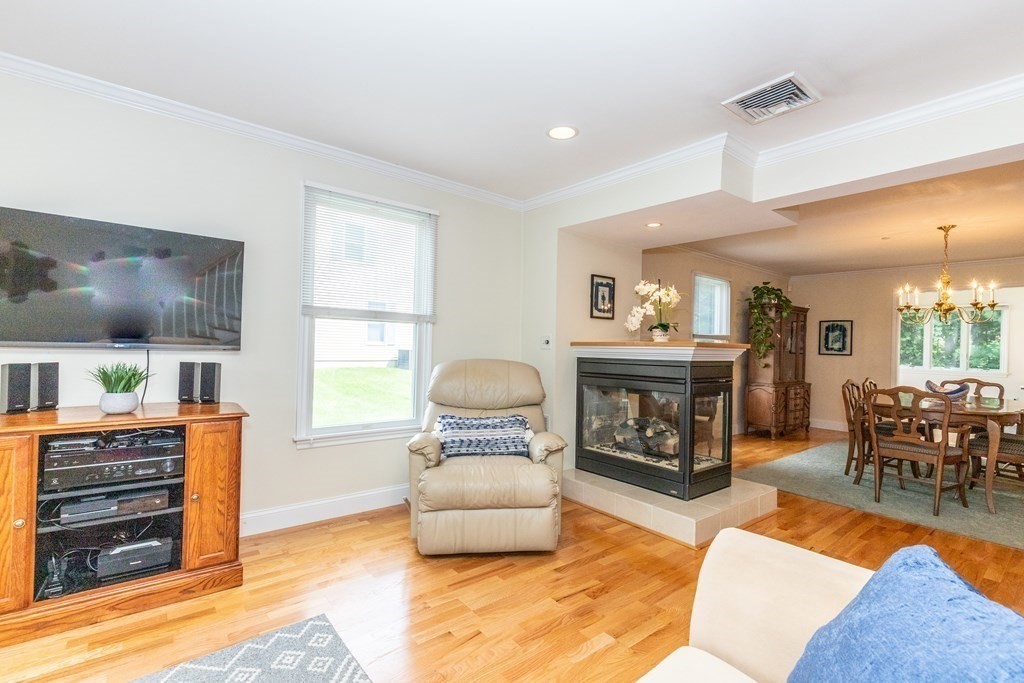 216 Rangeway Road, Unit 161 Billerica, MA 01862 - Photo 6 of 39 a living room with furniture and a fireplace