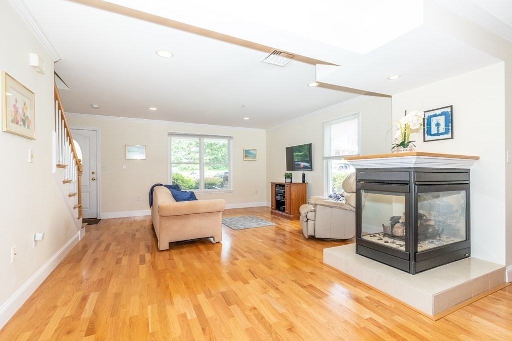 216 Rangeway Road, Unit 161 Billerica, MA 01862 - Photo 7 of 39 a living room with furniture and a fireplace