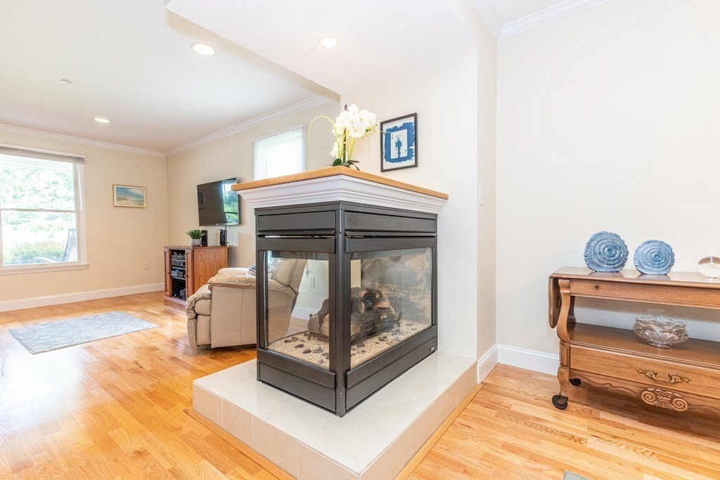 216 Rangeway Road, Unit 161 Billerica, MA 01862 - Photo 8 of 39 a living room with furniture and a fireplace