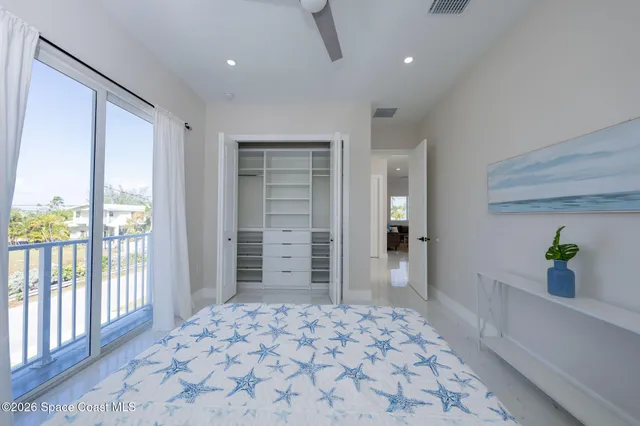 a view of balcony with wooden floor
