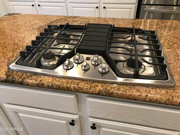 a close view of sink and stove