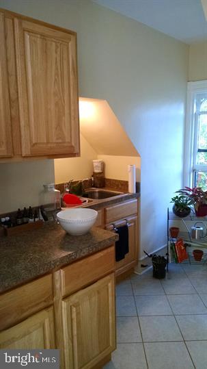 30 Cottage Avenue, Unit 3 Lancaster, PA 17602 - Photo 2 of 11 a kitchen with a stove and a cabinet