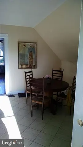 a view of a workspace with furniture