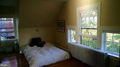 30 Cottage Avenue, Unit 3 Lancaster, PA 17602 - Photo 8 of 11 a bedroom with a bed and a window