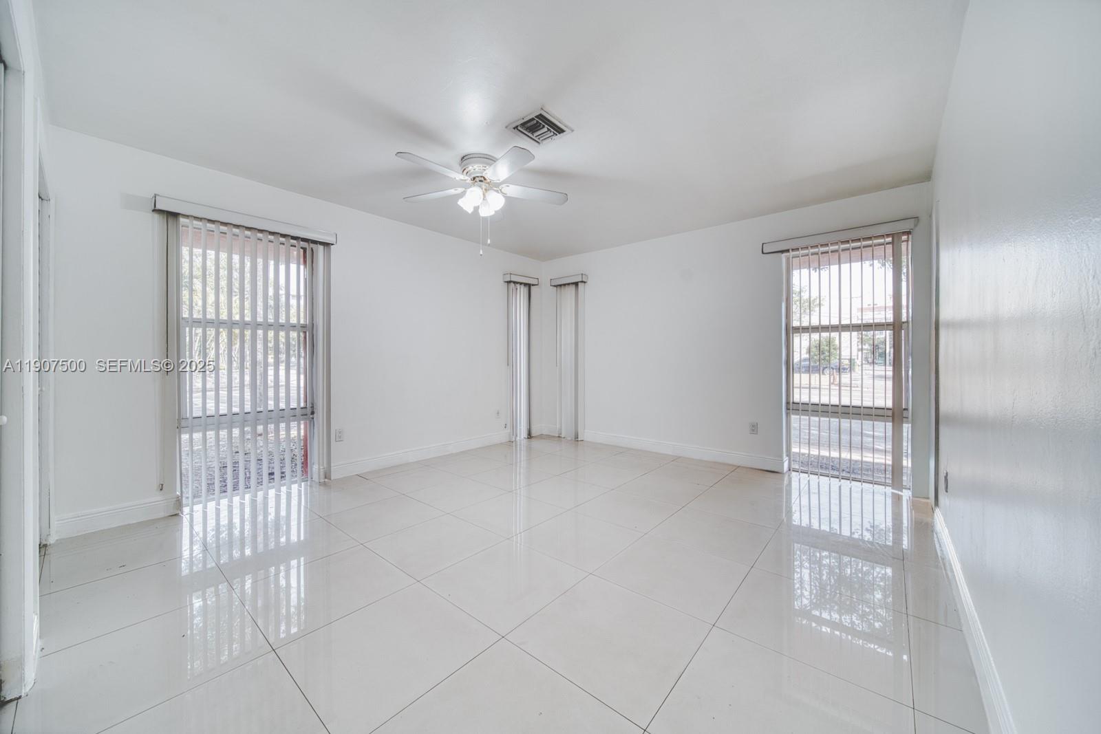 400 Minorca Avenue, Unit 1 Coral Gables, FL 33134 - Photo 9 of 21 a view of an empty room with a window