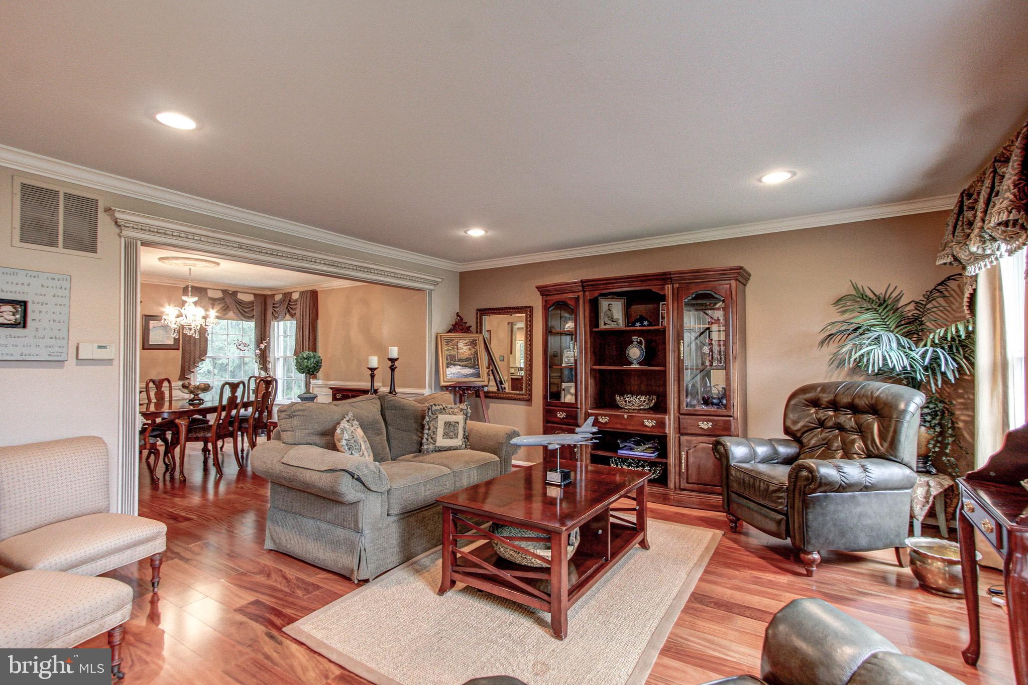 3 Raleigh Circle Medford, NJ 08055 - Photo 12 of 41 Living room with wide plank Brazilian cherry floor
