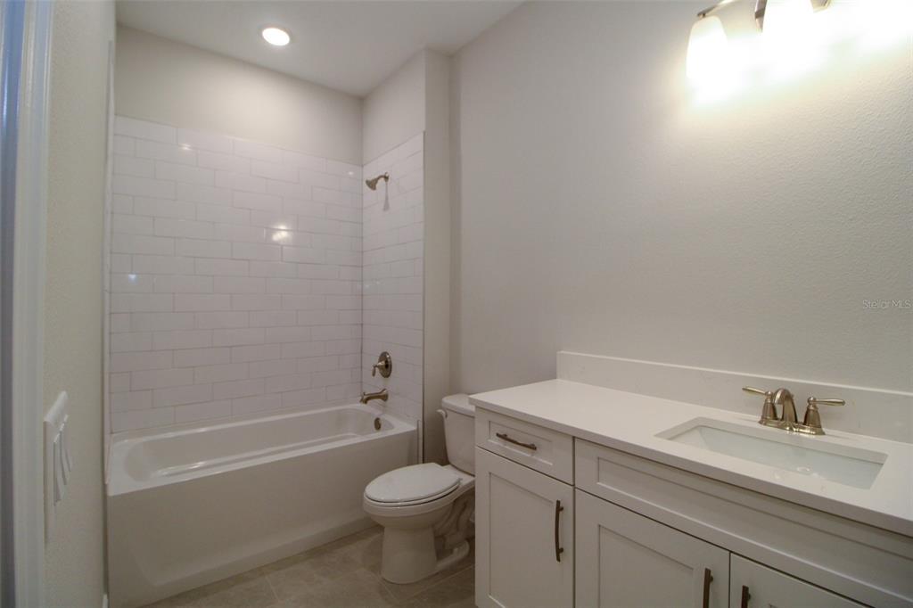 159 North Kinglet Avenue Hernando, FL 34442 - Photo 27 of 33 a bathroom with a sink a toilet and shower