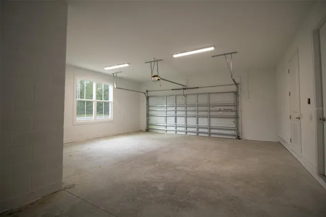 a view of empty room with windows