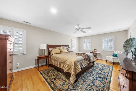 a bed room with a bed and a window