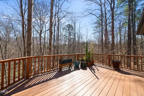a view of a pathway both side of house