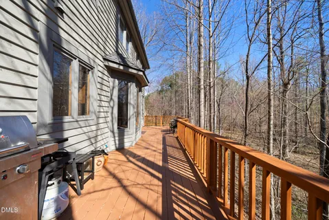 a view of a street with trees on both side of it