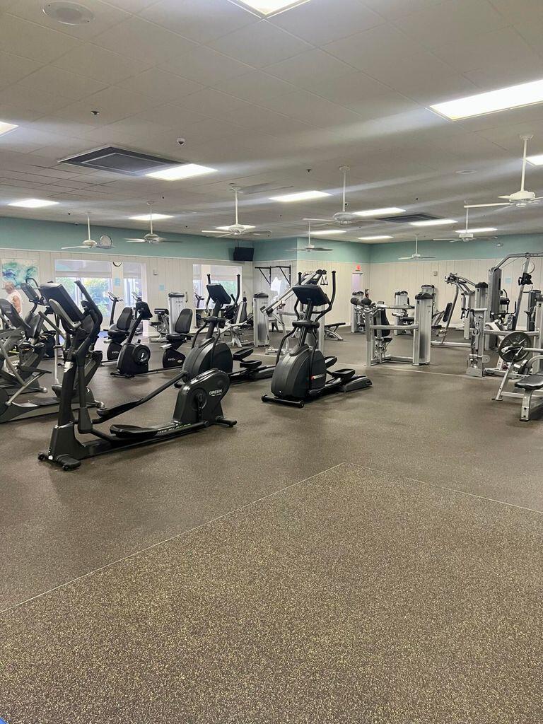 247 Capri F Delray Beach, FL 33484 - Photo 26 of 30 a view of a room with gym equipment