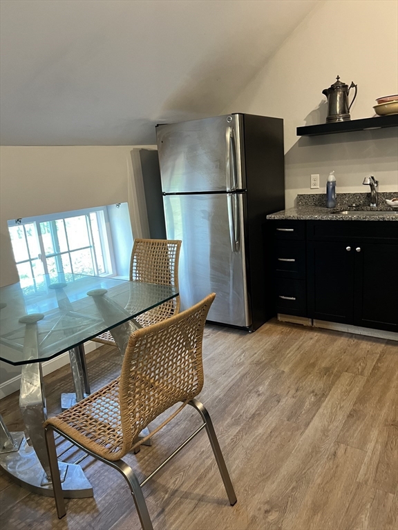 54 Longmeadow Road, Unit 5 Taunton, MA 02780 - Photo 4 of 10 a kitchen with a sink appliances and cabinets