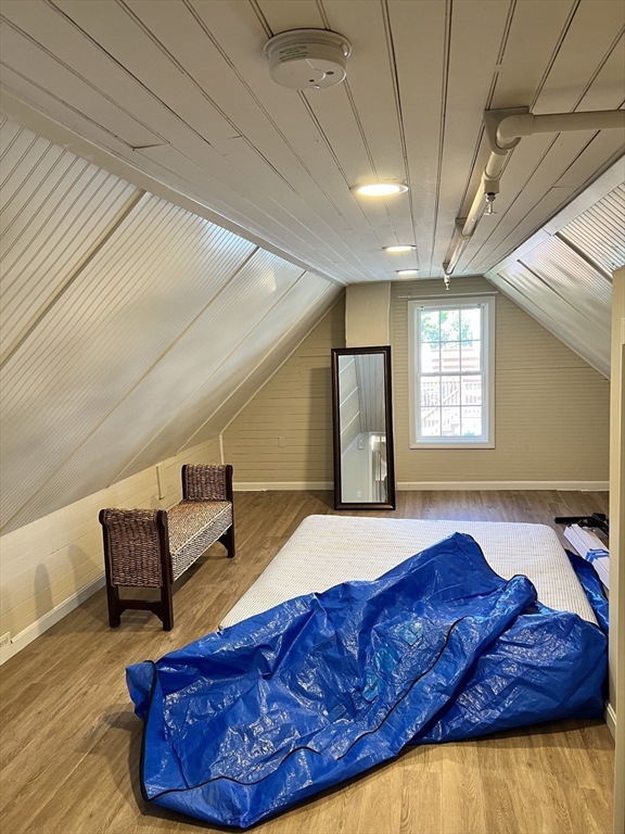 54 Longmeadow Road, Unit 5 Taunton, MA 02780 - Photo 7 of 10 a living room with couches rug and wooden floor