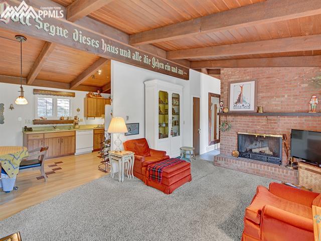 9455 Shoshone Road Cascade, CO 80809 - Photo 10 of 30 Looking From Living Room to Eat in Country Kitchen