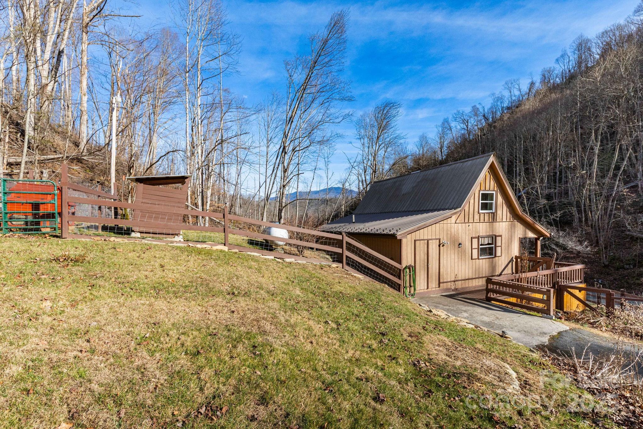 1010 Melton Branch Road Bakersville, NC 28705 - Photo 20 of 43 a house view with a outdoor space