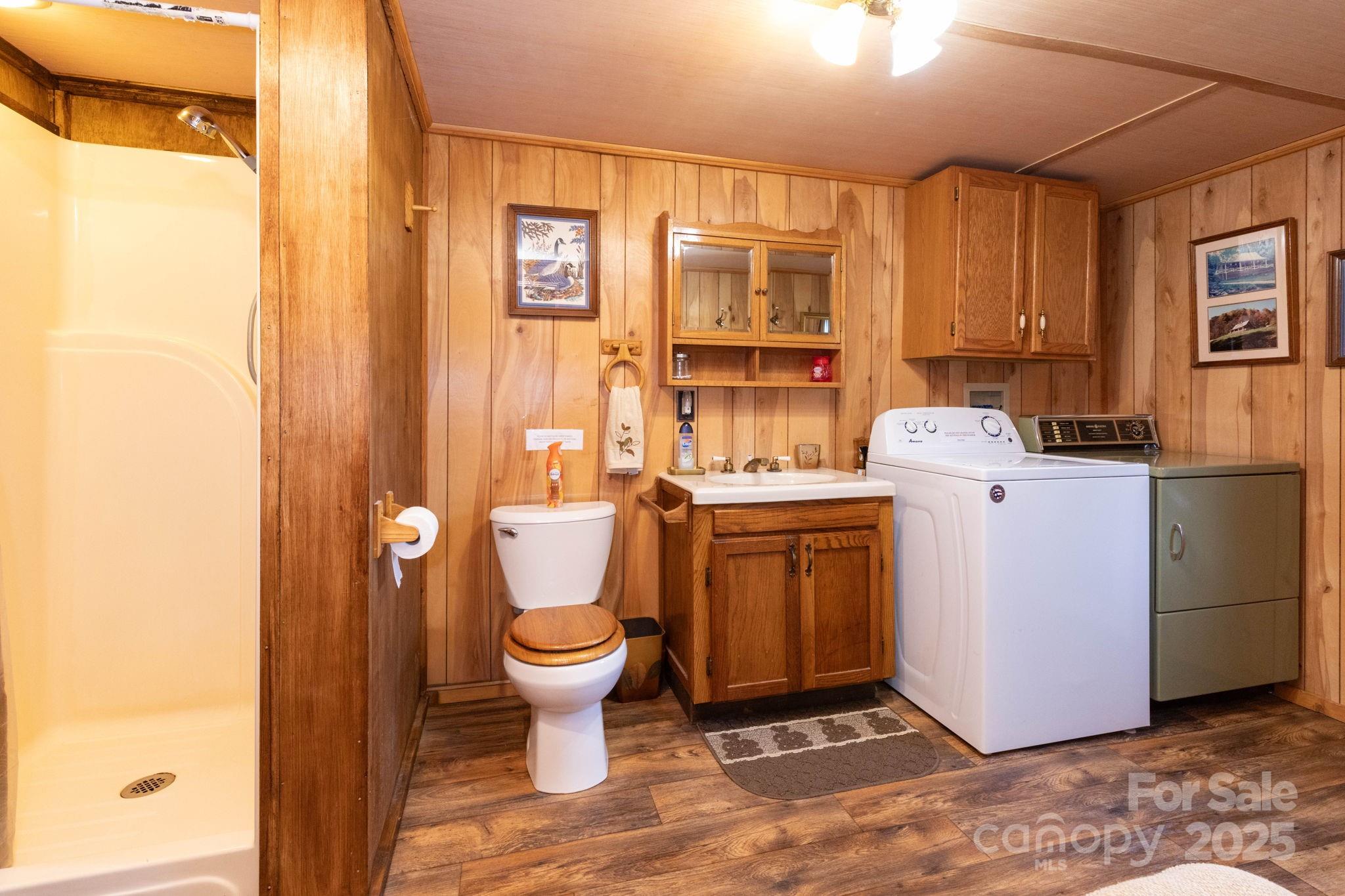 1010 Melton Branch Road Bakersville, NC 28705 - Photo 27 of 43 a view of bathroom with a sink toilet and shower