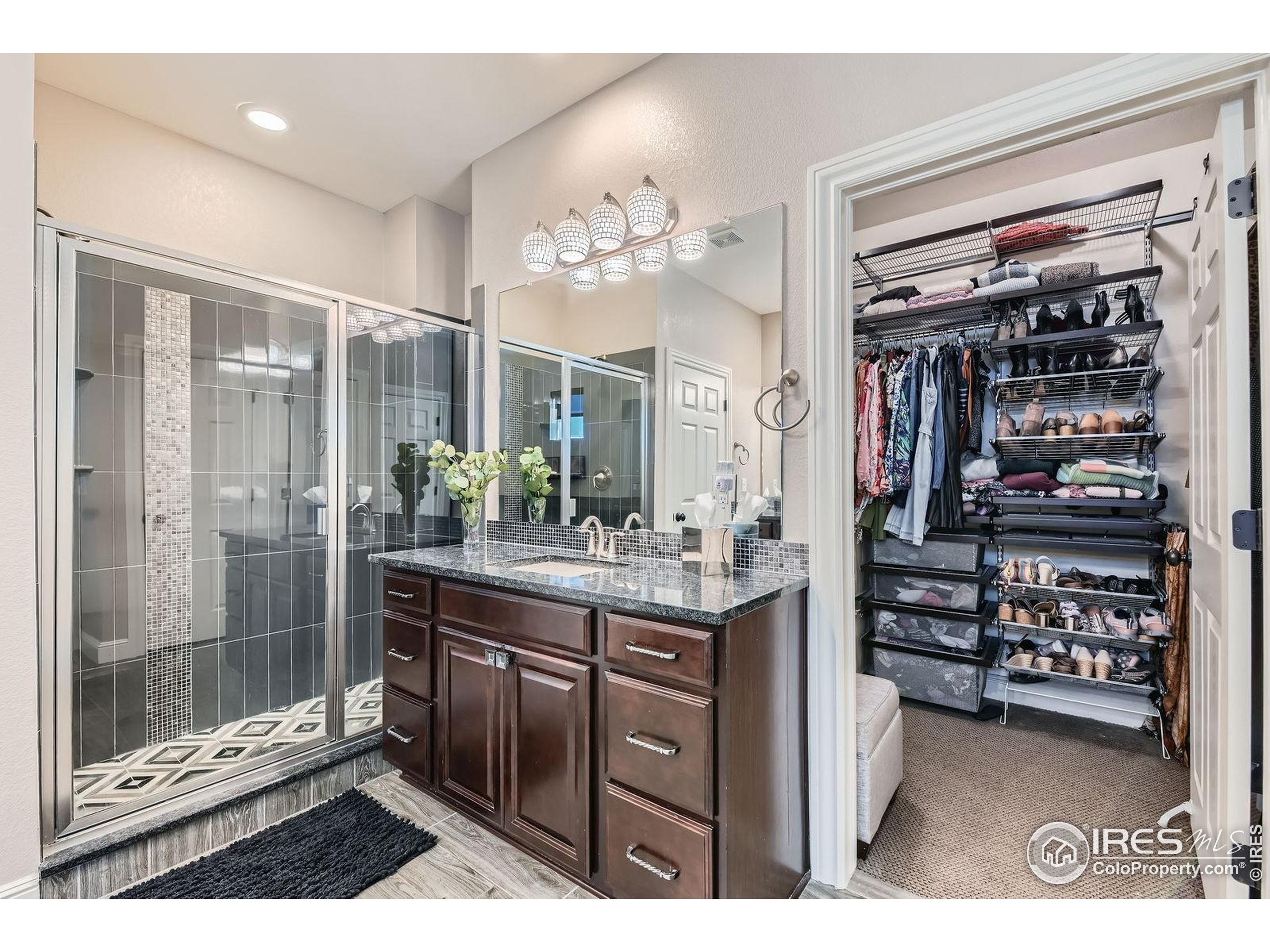 10834 Graphite Street Broomfield, CO 80021 - Photo 16 of 34 a kitchen with a refrigerator and a sink