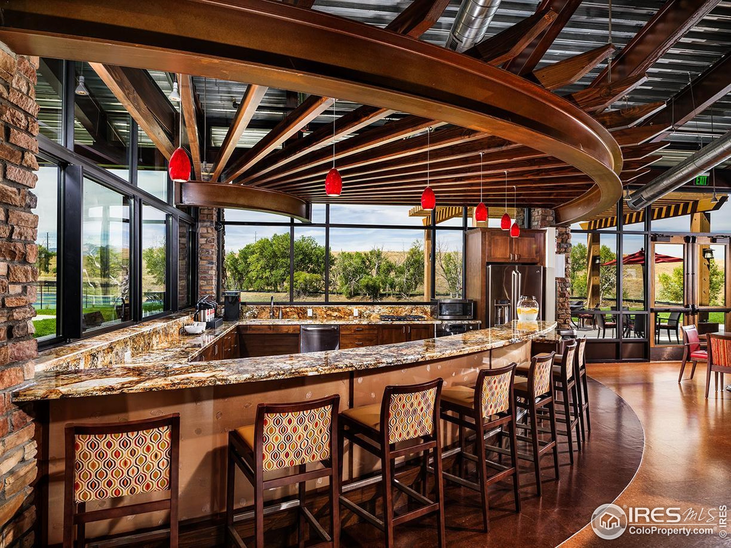 10834 Graphite Street Broomfield, CO 80021 - Photo 34 of 34 a view of a dining room with furniture window and outside view