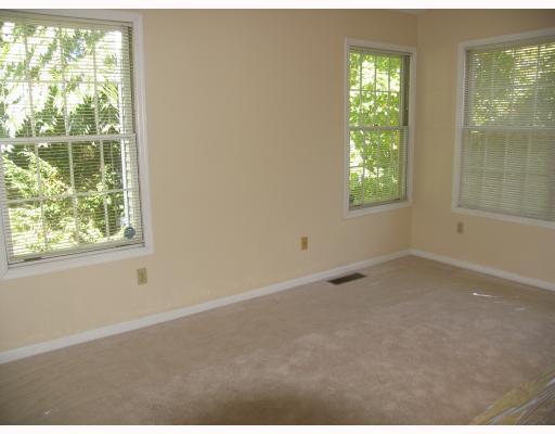 150 Prospect Street, Unit 7 Greenwich, CT 06830 - Photo 4 of 6 an empty room with windows