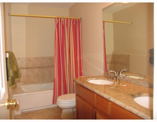 150 Prospect Street, Unit 7 Greenwich, CT 06830 - Photo 5 of 6 a bathroom with a sink and a mirror