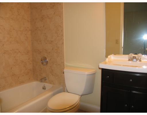 150 Prospect Street, Unit 7 Greenwich, CT 06830 - Photo 6 of 6 a bathroom with a sink mirror toilet and bathtub