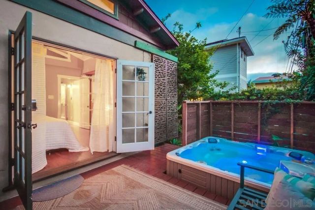 a small pool with a bench in front of it