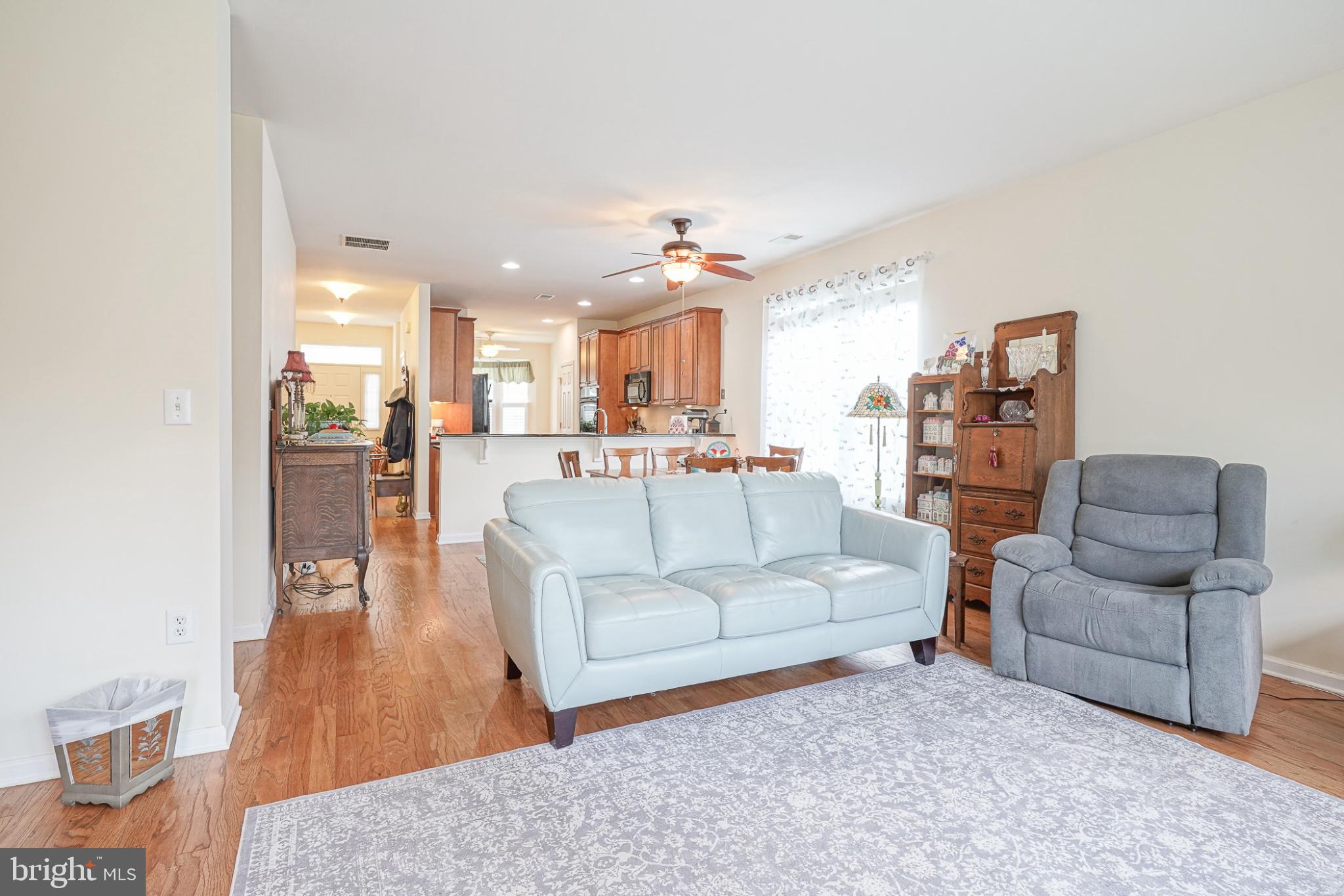 213 Limerick Street Absecon, NJ 08205 - Photo 17 of 39 Spacious living area with warm tones.