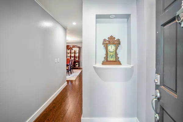 a view of entryway with wooden floor