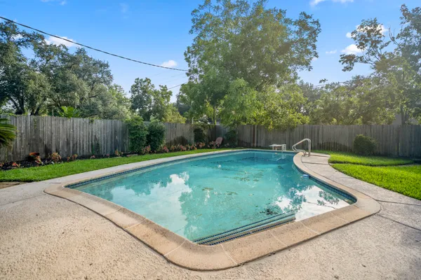 a view of a backyard with a small cabin