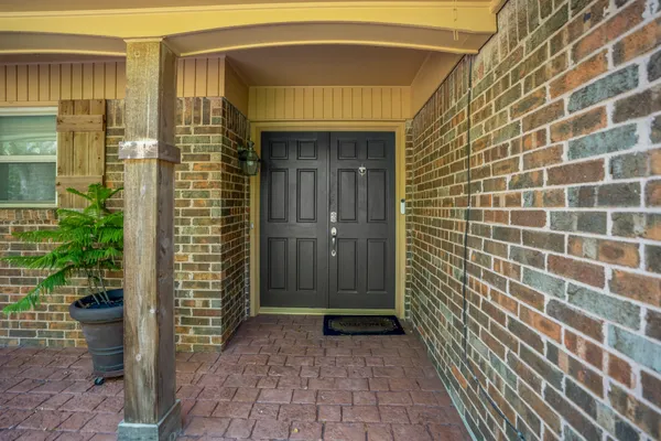 a front view of a house with a shower